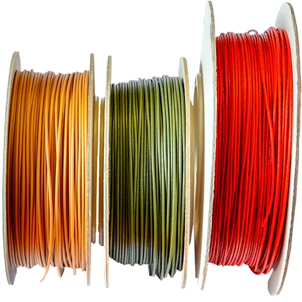 Kompozytowy biodegradowalny filament PLA z dodatkami odpadów m. in. z oliwek i pomidorów (biodegradowalnych).